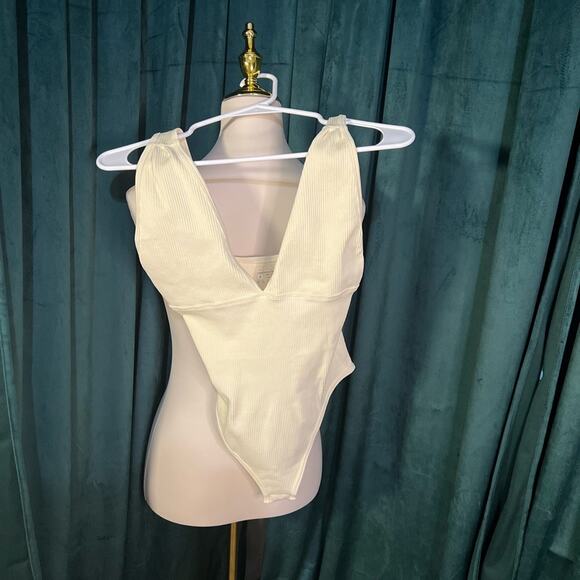 OQQ Tops - OQQ Cream Ribbed Bodysuit